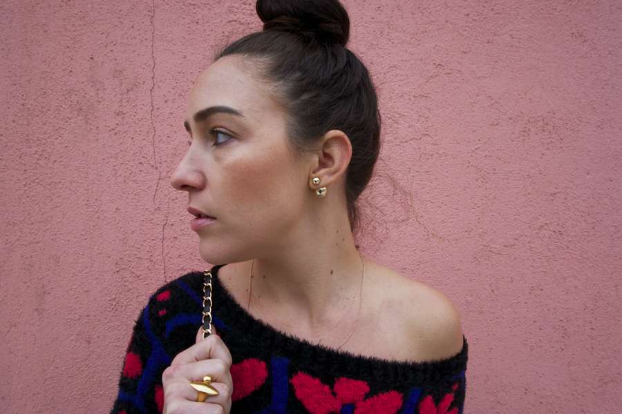 gold earrings gold ring pink wall