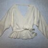 Cream cinched sweater