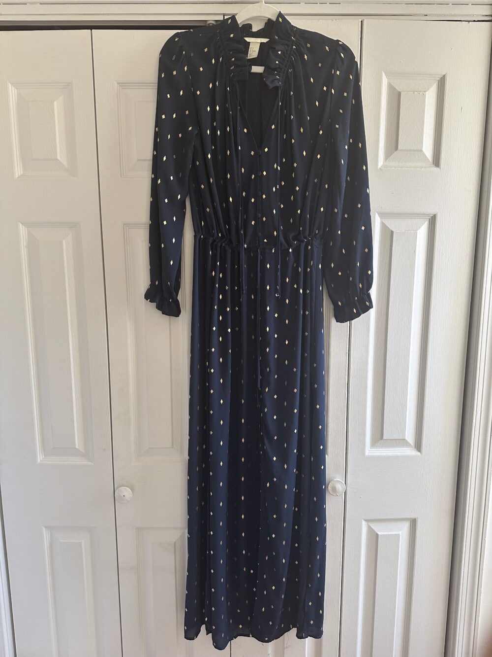 navy polka-dot dress
