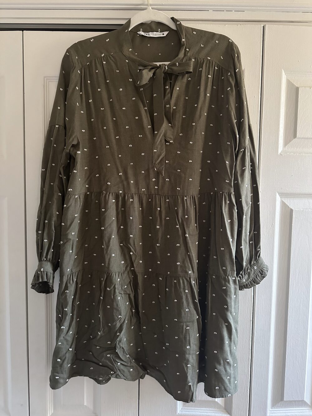 green polka-dot dress
