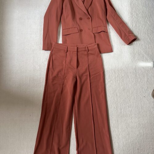 burnt orange suit