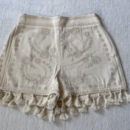 tan patterned shorts