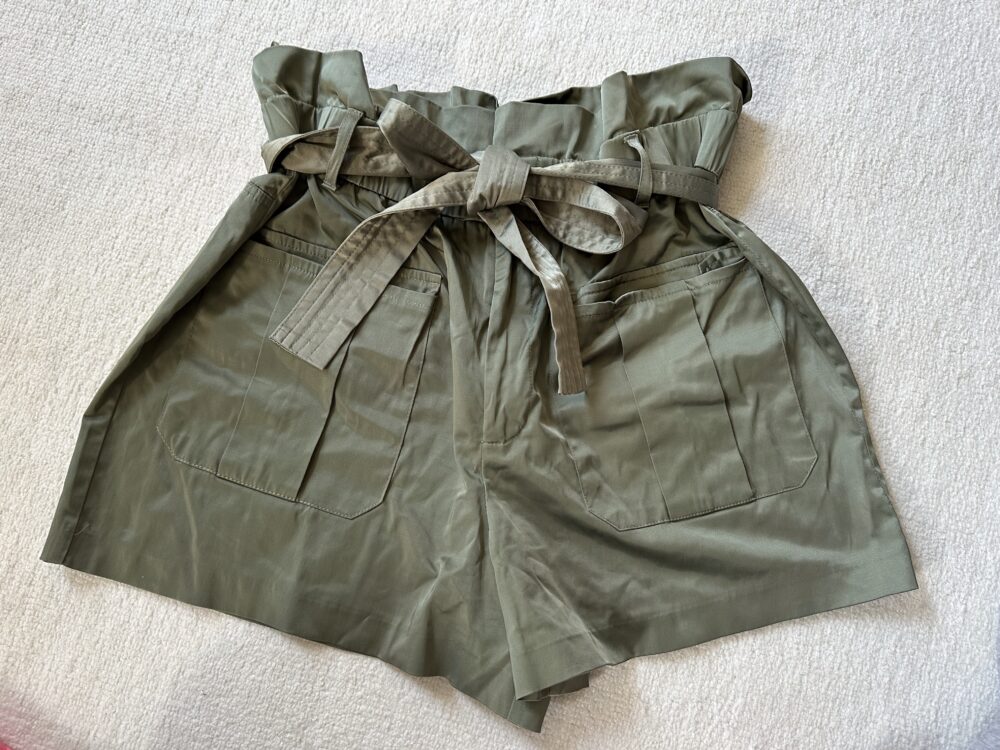 green shorts with bow